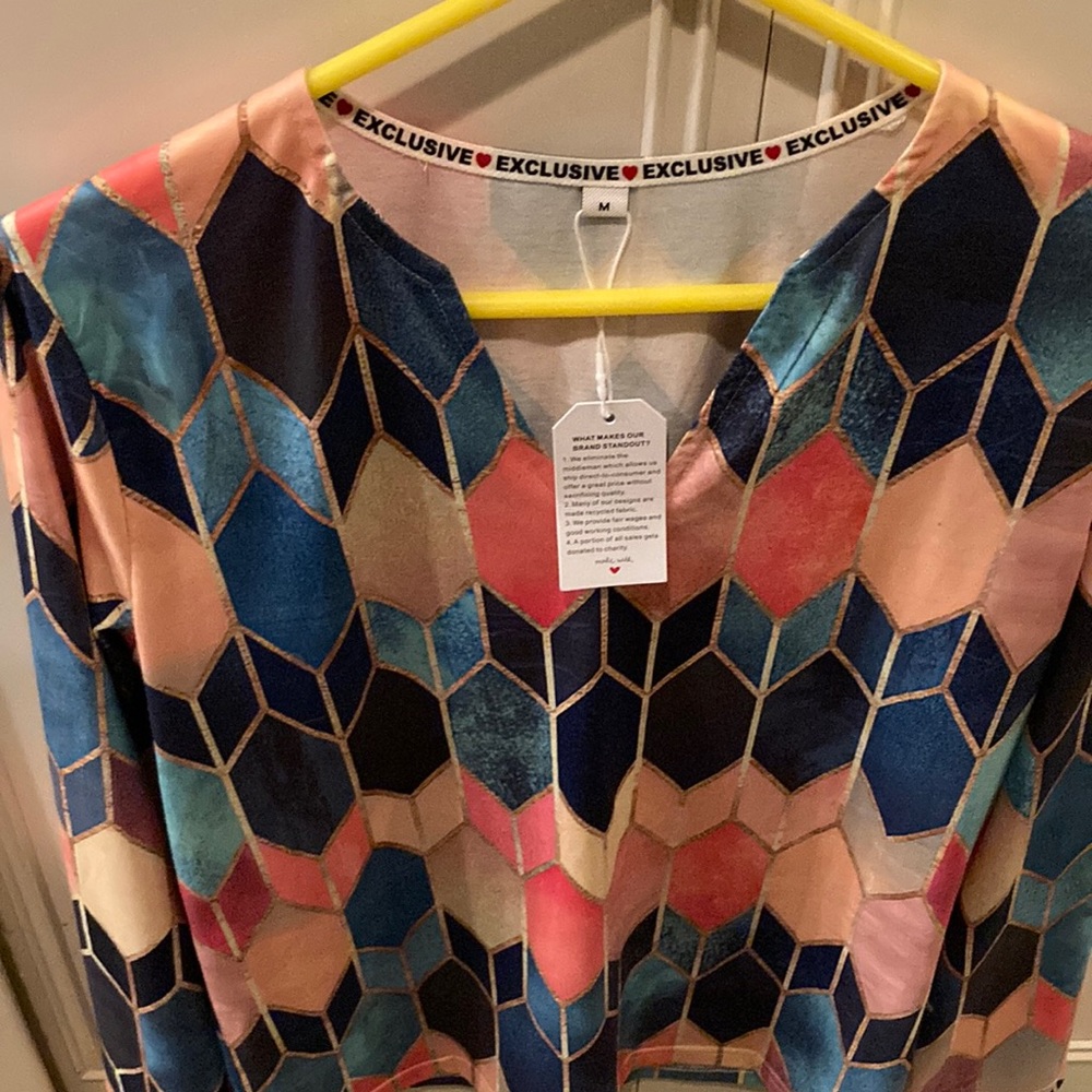 Exclusive with a tag about the company. Beautiful color & design and nice style